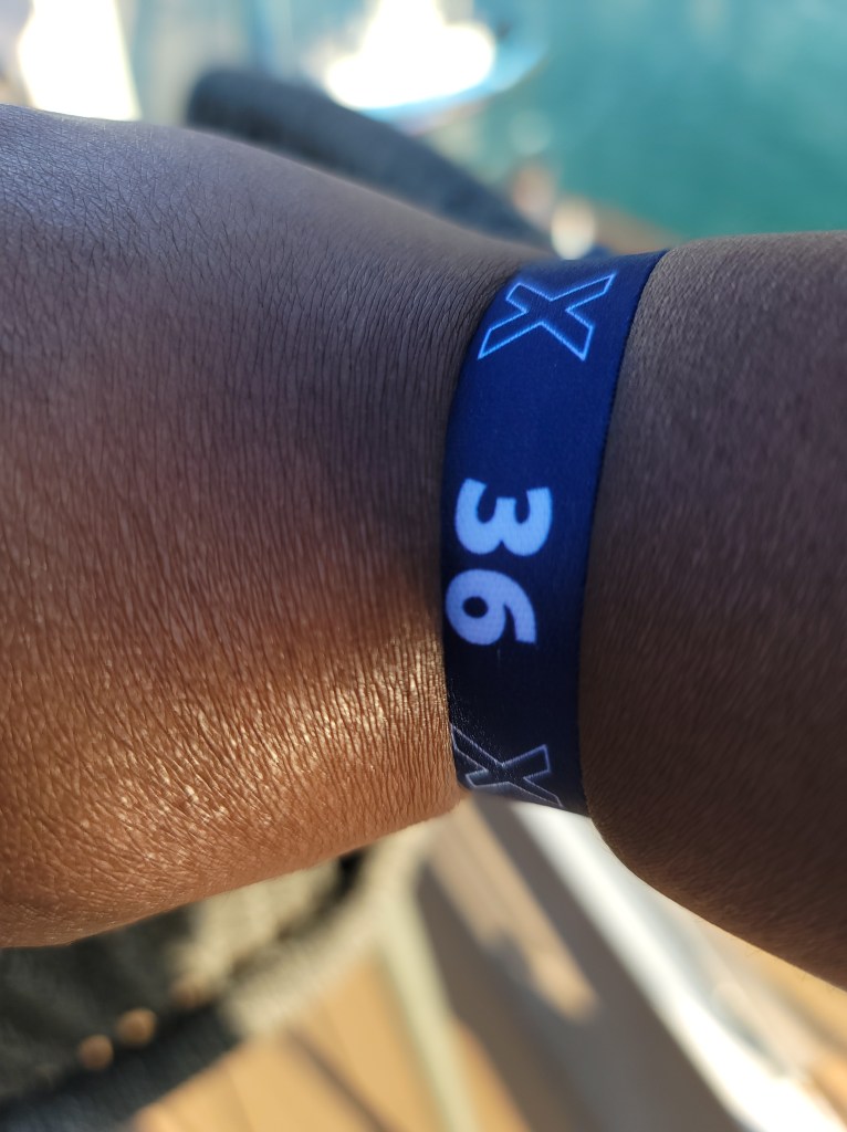 Celebrity Cruises Extend Your Stay wristband and temporary SeaPass card