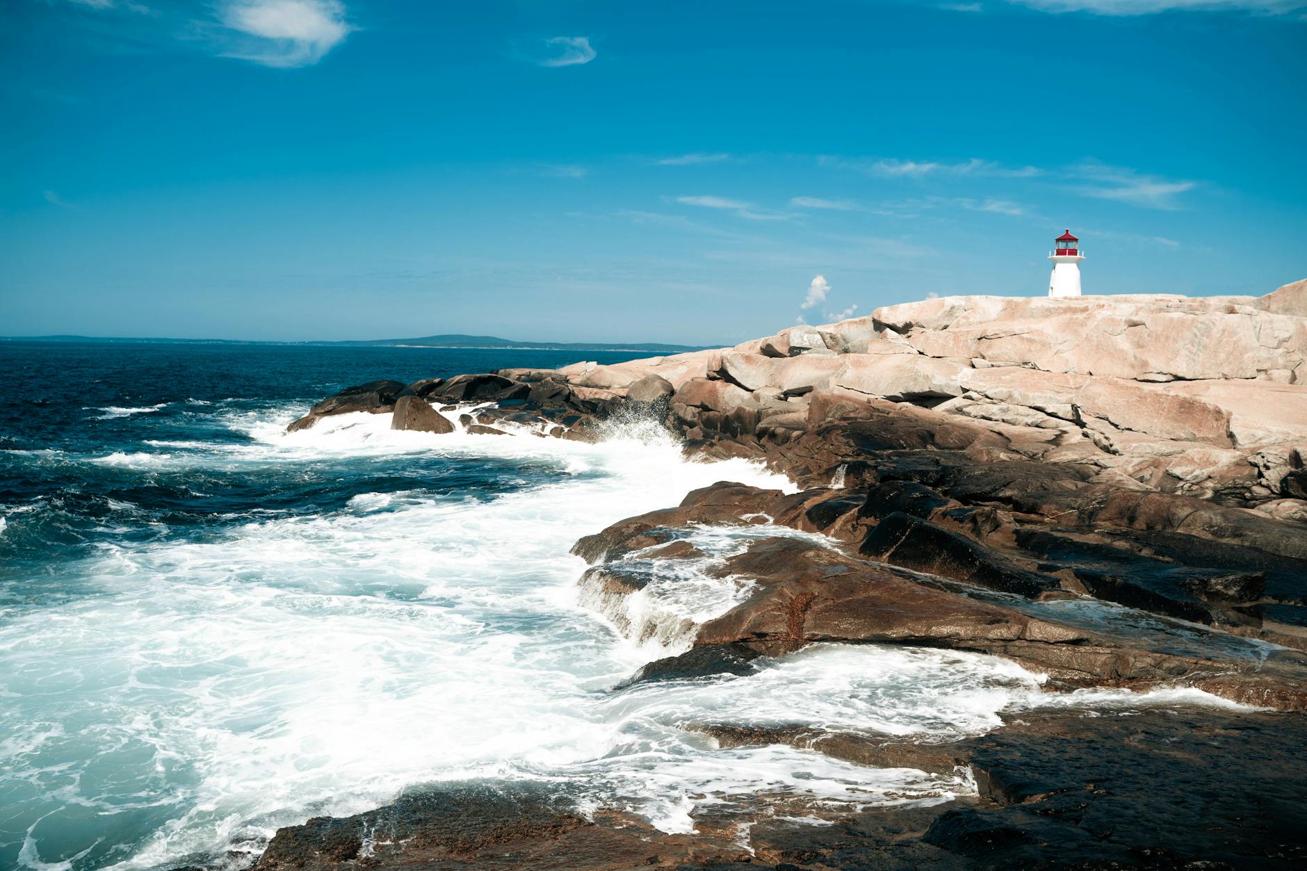 Rugged rocky coastline and crashing waves in Atlantic Canada