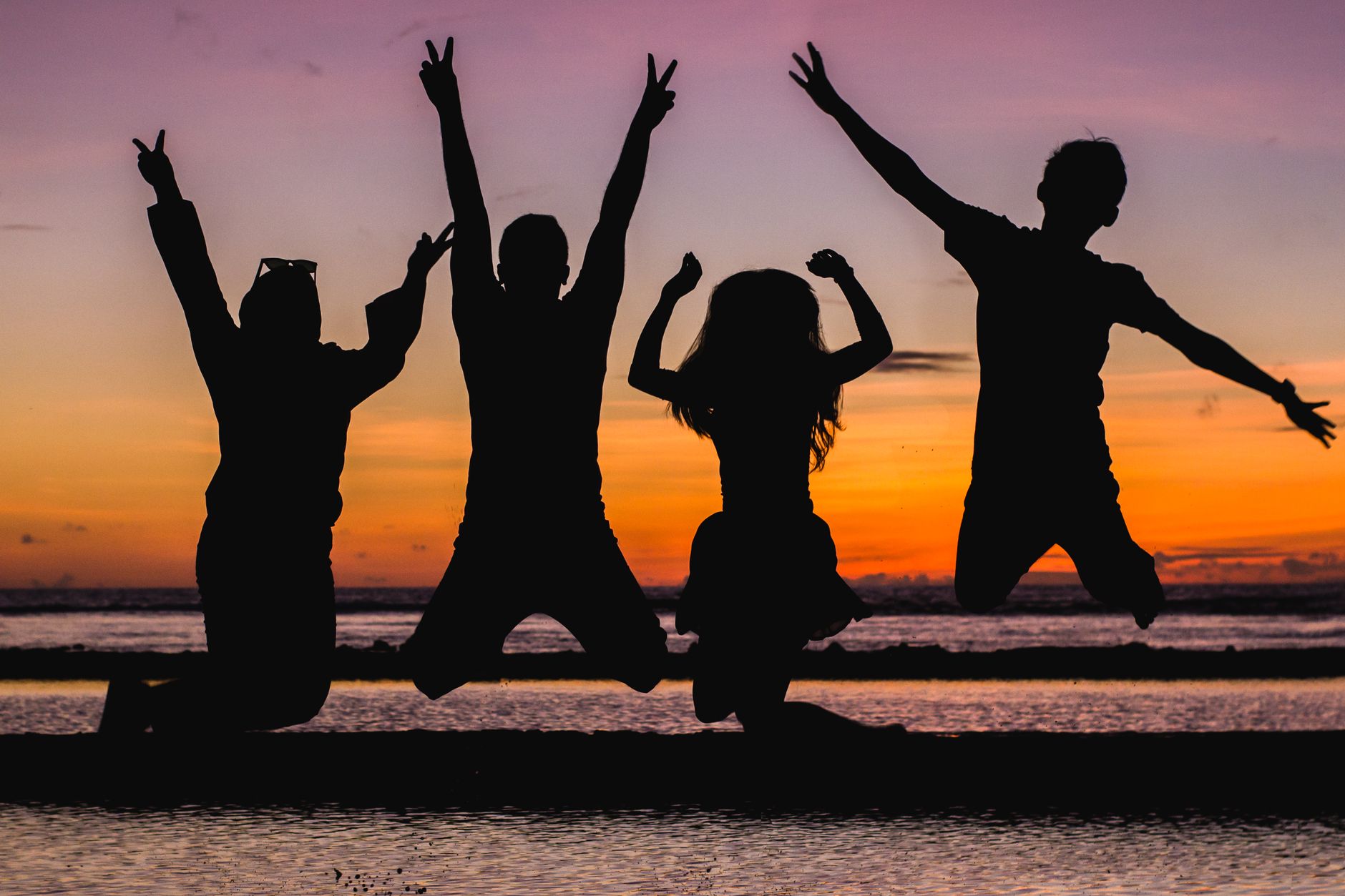 Silhouette of teens jumping-Teen Birthday Cruise Ideas