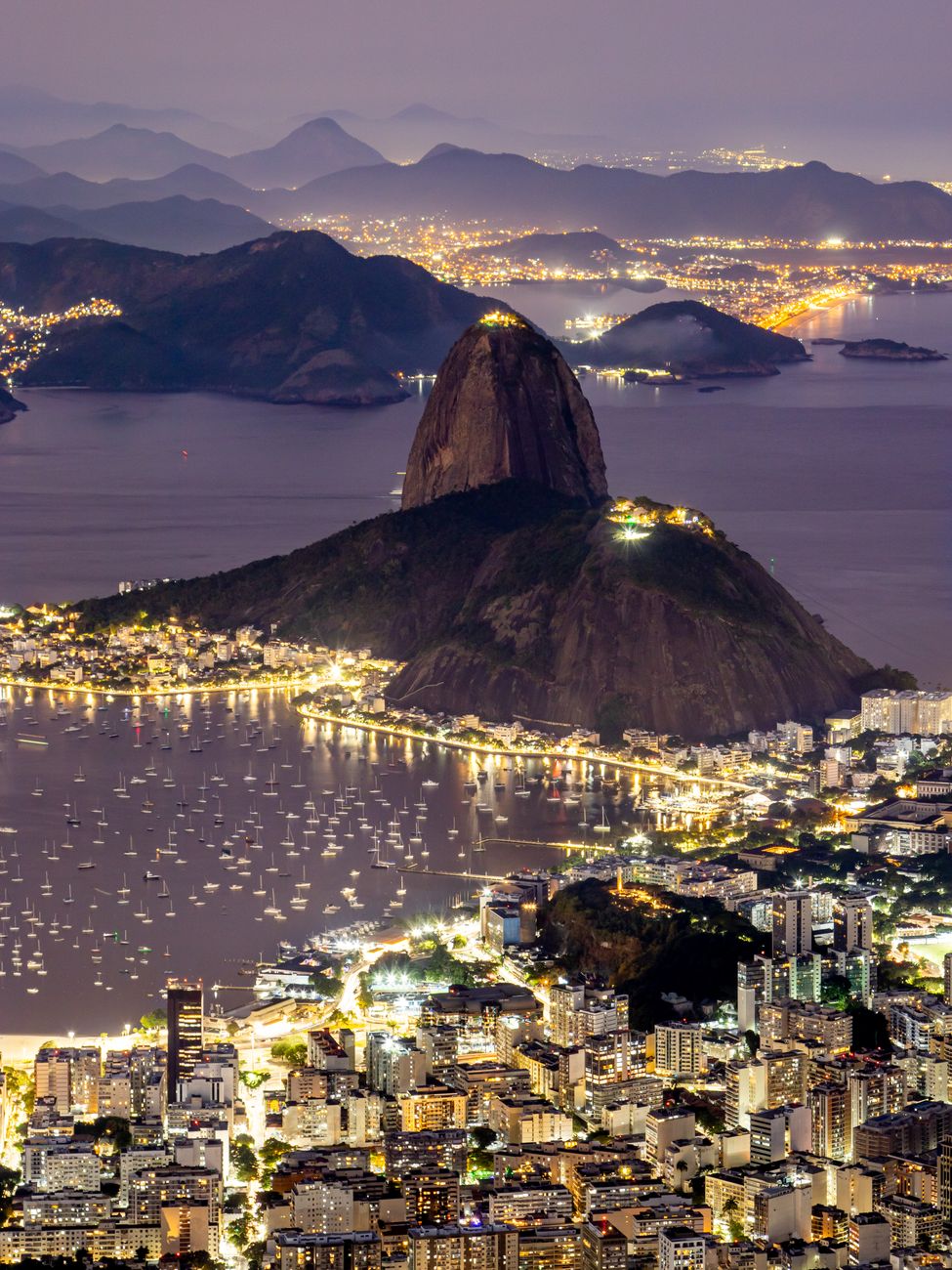 sugarloaf mountain off the coast of rio de janeiro in the evening, Cruise Destinations